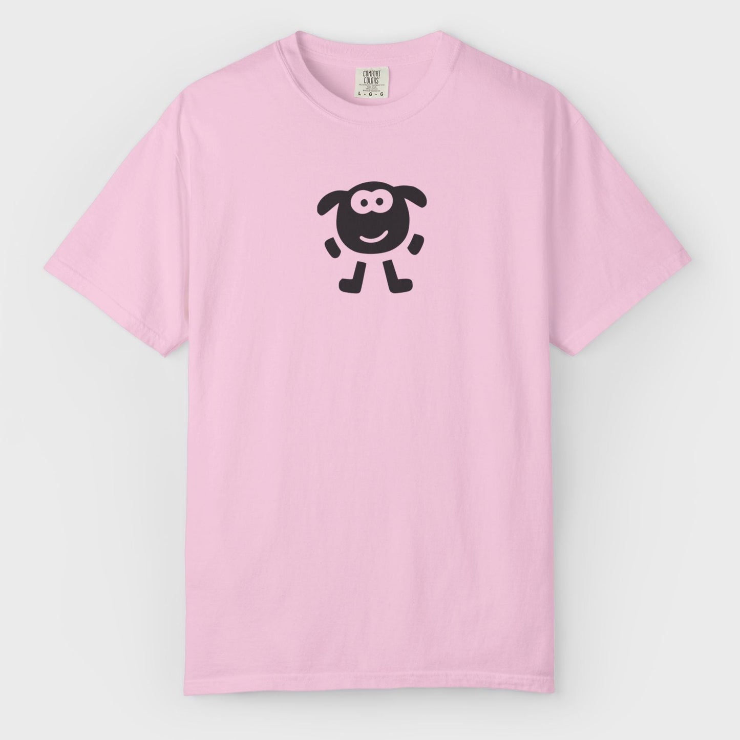 Pink t-shirt with a black sheep logo on a light gray background